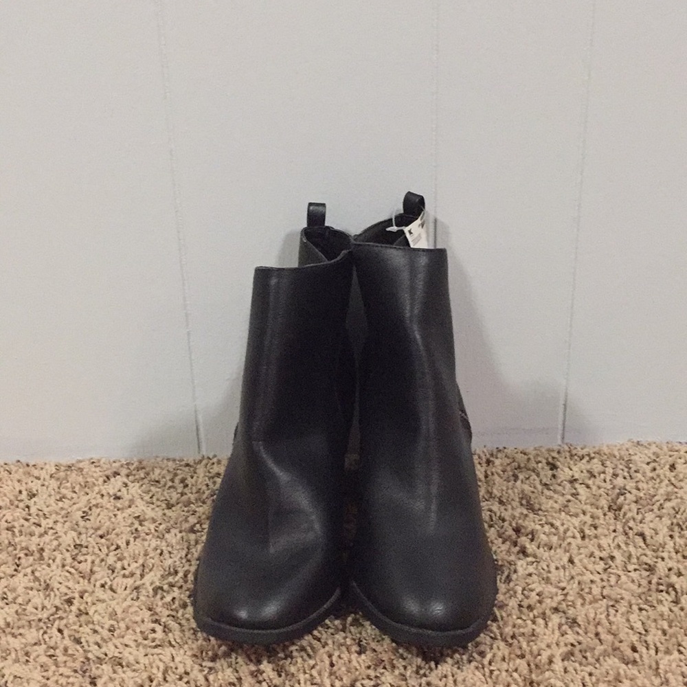 Women’s black heeled booties
